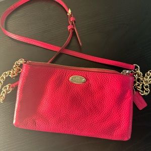 Bright pink Coach cross body purse